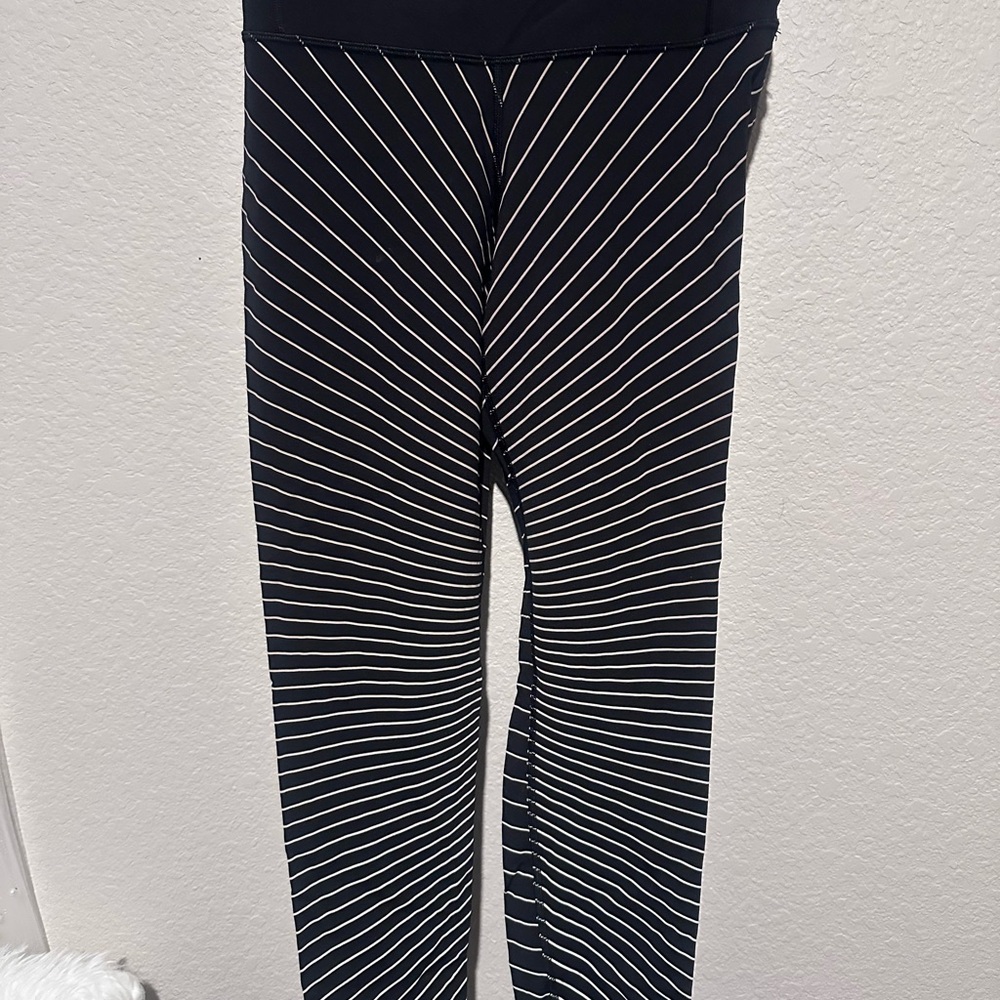 Lululemon Athletica Black and light gold striped leggings